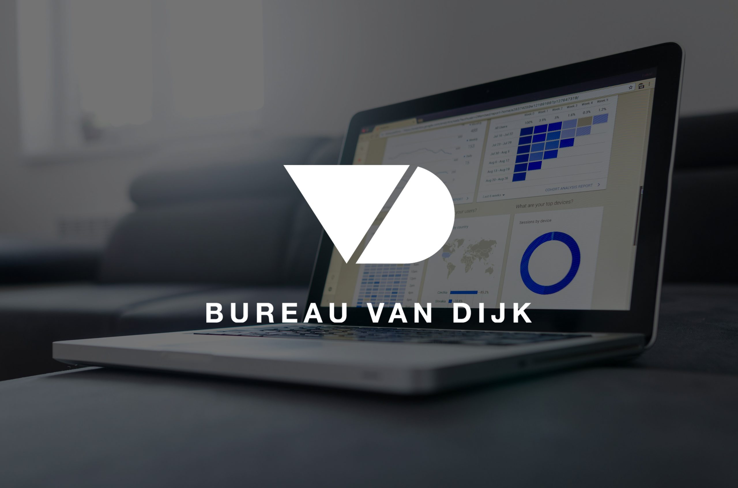 A laptop placed on a table, displaying statistical data with the logo Bureau Van Dijk displayed on top