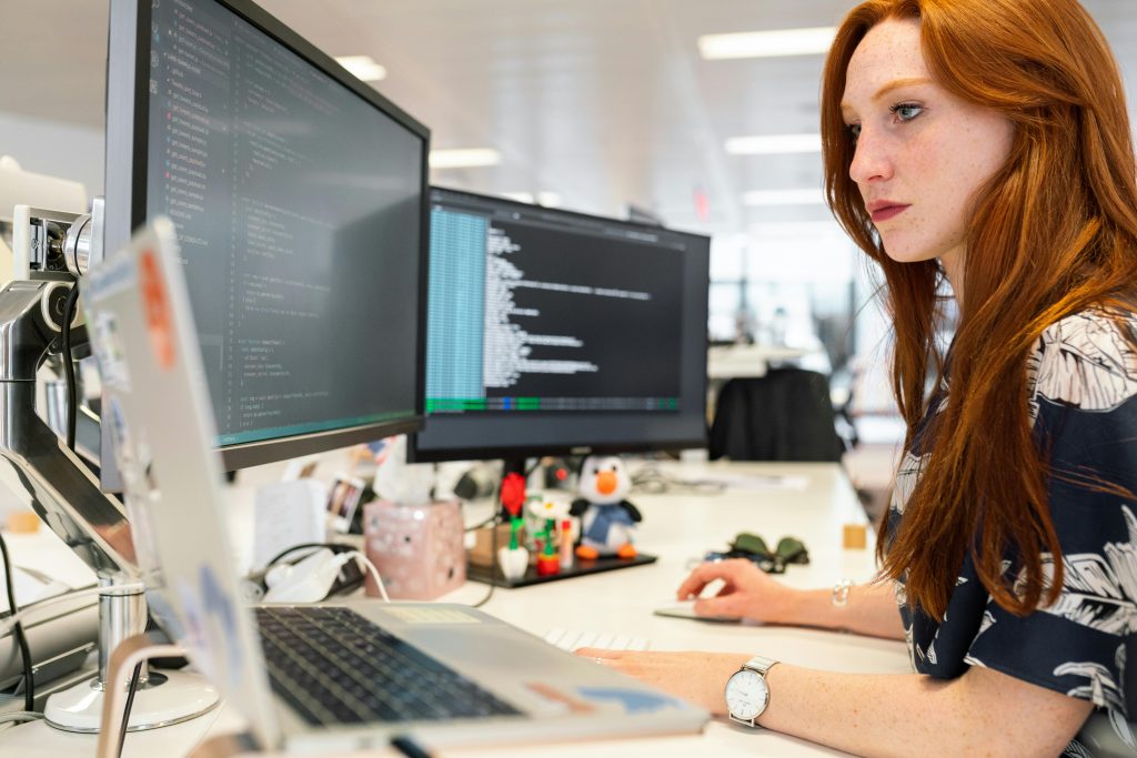 pexels-thisisengineering-3861958 An employee analysing data